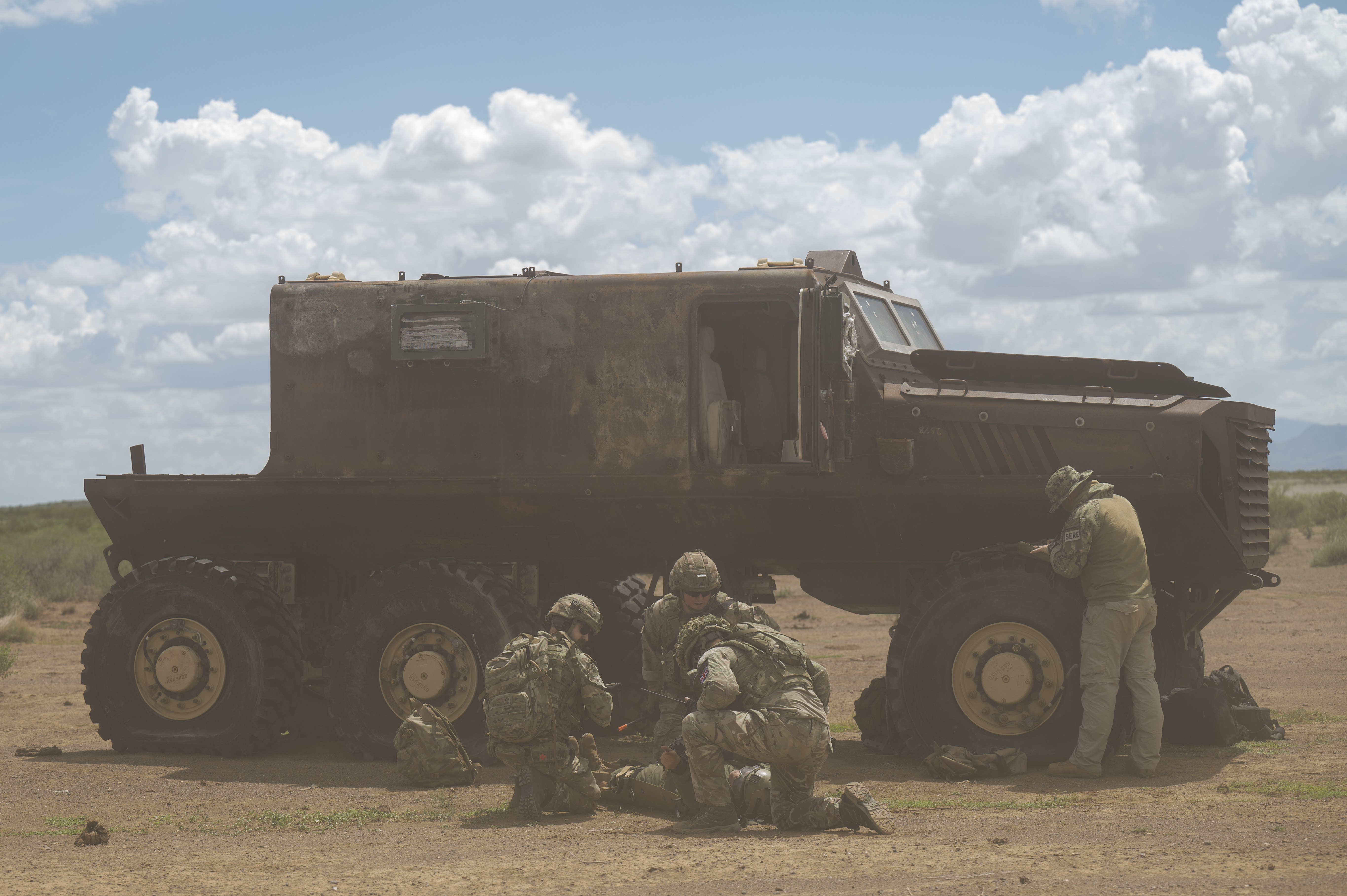 Image shows RAF Regiment with vehicle in the desert.